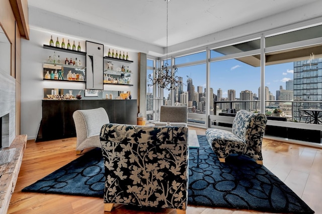 333 N Canal St Unit 3401, Chicago, IL 60606 - dining room with a skyline view, a bar, plenty of natural light, wood finished floors, and a wall of windows