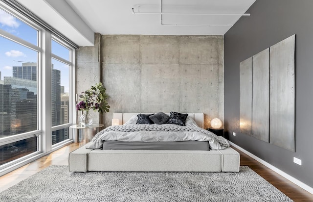 333 N Canal St Unit 3401, Chicago, IL 60606 - bedroom with wood finished floors and a city view