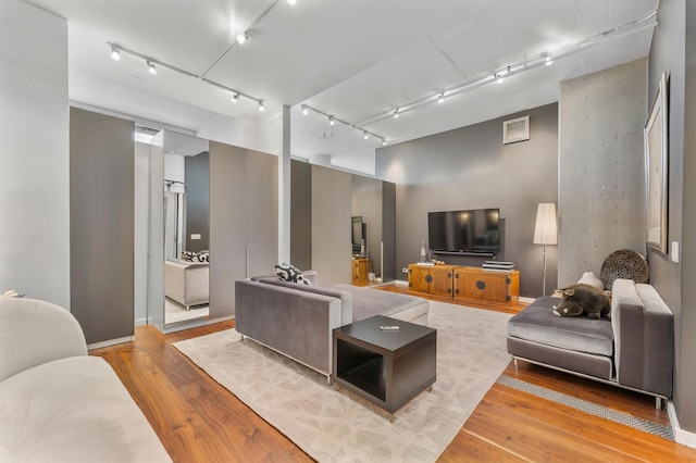 333 N Canal St Unit 3401, Chicago, IL 60606 - living room with rail lighting and light wood finished floors