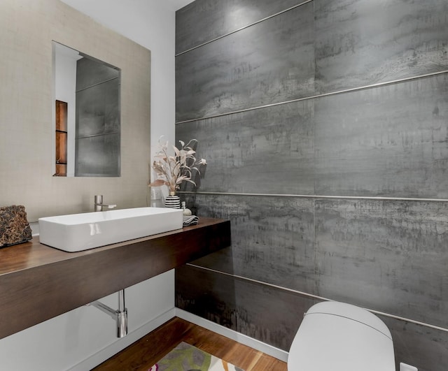 333 N Canal St Unit 3401, Chicago, IL 60606 - half bathroom with toilet, wood finished floors, and vanity