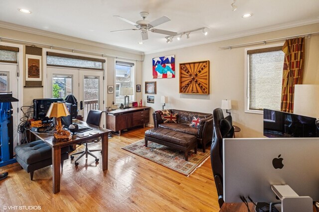 office with french doors, ornamental molding, light wood finished floors, and a ceiling fan
