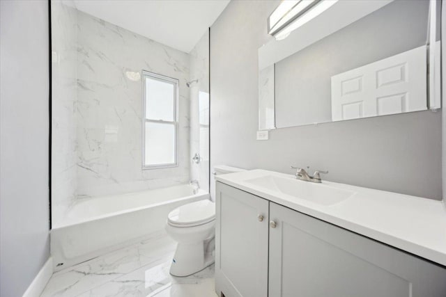 bathroom featuring toilet, marble finish flooring, vanity, bathing tub / shower combination, and baseboards