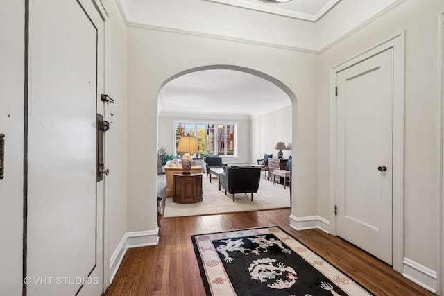 2472 W Estes Ave Unit 2, Chicago, IL 60645 - entrance foyer featuring arched walkways, hardwood / wood-style flooring, crown molding, and baseboards