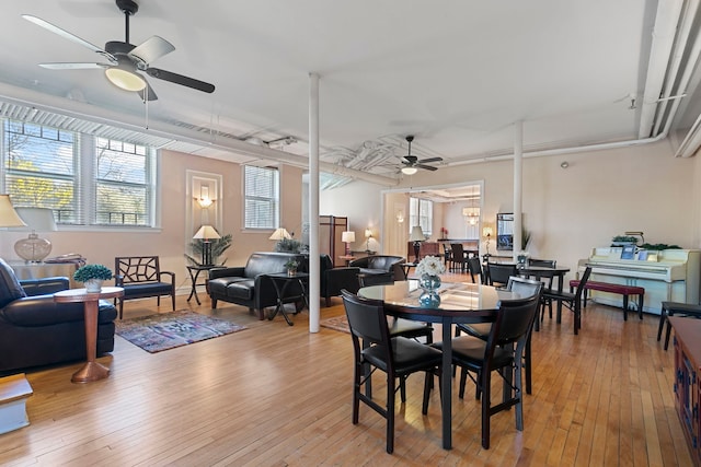 2472 W Estes Ave Unit 2, Chicago, IL 60645 - dining room featuring a ceiling fan, light wood-style floors, and healthy amount of natural light
