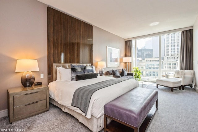 401 N Wabash Ave Unit 2534, Chicago, IL 60611 - bedroom with carpet, expansive windows, access to exterior, and a city view