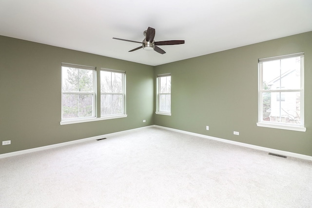 140 Tanglewood Dr, Glen Ellyn, IL 60137 - carpeted spare room with a ceiling fan and baseboards