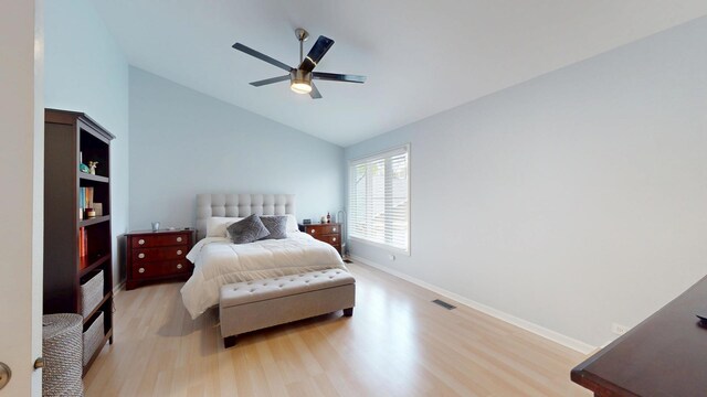 1322 Downs Pkwy, Libertyville, IL 60048 - bedroom featuring light wood-style flooring, baseboards, a ceiling fan, and high vaulted ceiling