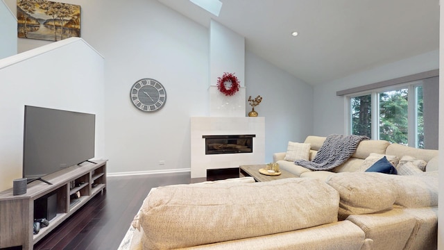 1322 Downs Pkwy, Libertyville, IL 60048 - living room featuring wood finished floors, high vaulted ceiling, a glass covered fireplace, baseboards, and a skylight
