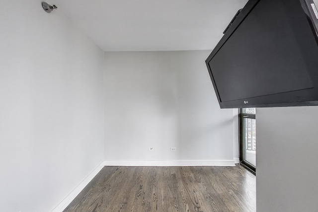 400 N Lasalle St Unit 2207, Chicago, IL 60654 - spare room featuring dark wood-type flooring and baseboards