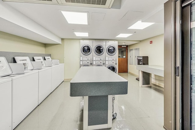 400 N Lasalle St Unit 2207, Chicago, IL 60654 - communal laundry room featuring stacked washer / drying machine, independent washer and dryer, and electric panel
