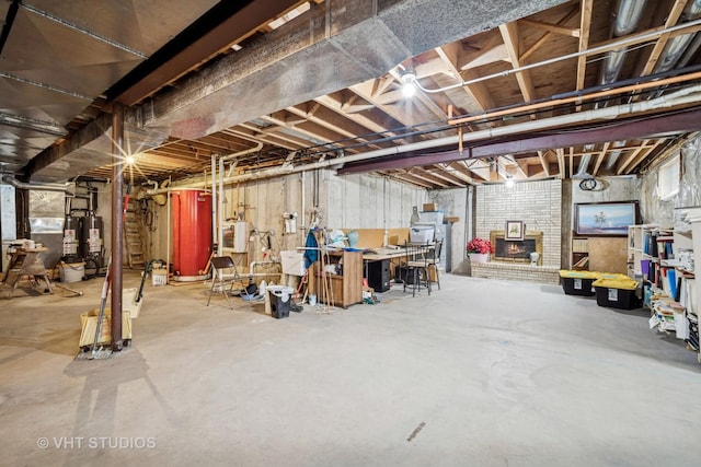 unfinished basement with gas water heater