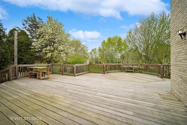 deck with view of wooded area