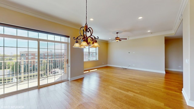 unfurnished dining area with crown molding, baseboards, light wood-style flooring, ceiling fan, and recessed lighting