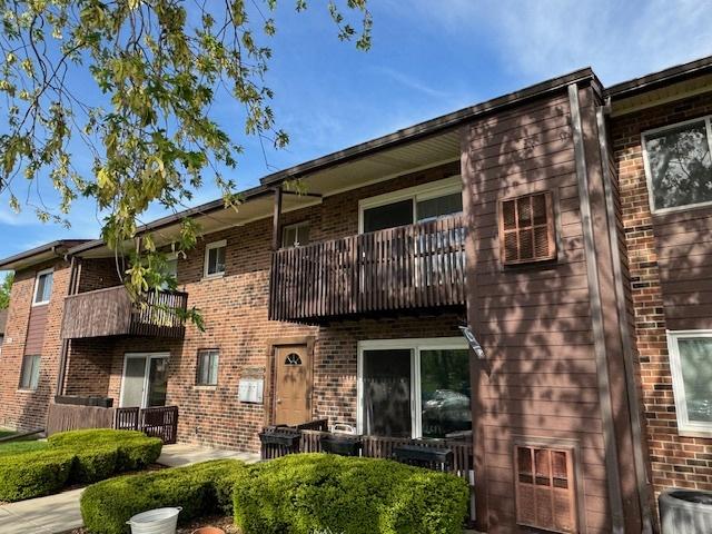 18063 Live Oak Ct Unit 1608, Tinley Park, IL 60477 - view of building exterior with central air condition unit