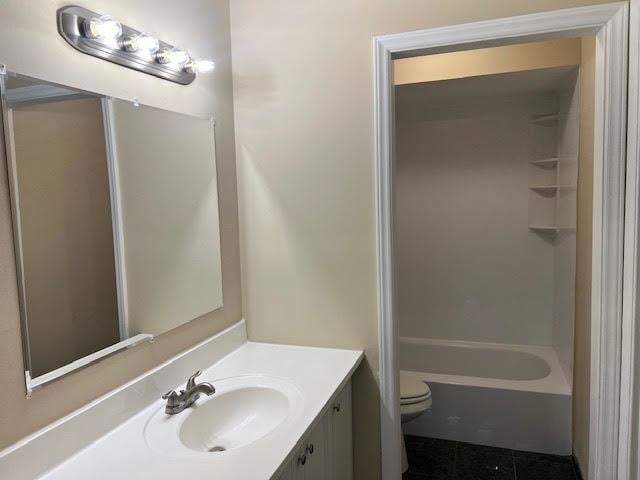 18063 Live Oak Ct Unit 1608, Tinley Park, IL 60477 - full bath featuring toilet, tile patterned floors, vanity, and tub / shower combination