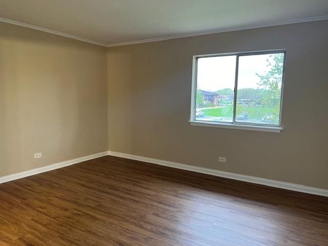 18063 Live Oak Ct Unit 1608, Tinley Park, IL 60477 - empty room with ornamental molding, dark wood-style floors, and baseboards