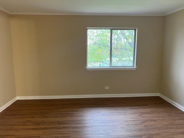 18063 Live Oak Ct Unit 1608, Tinley Park, IL 60477 - spare room featuring dark wood-style floors, baseboards, and crown molding