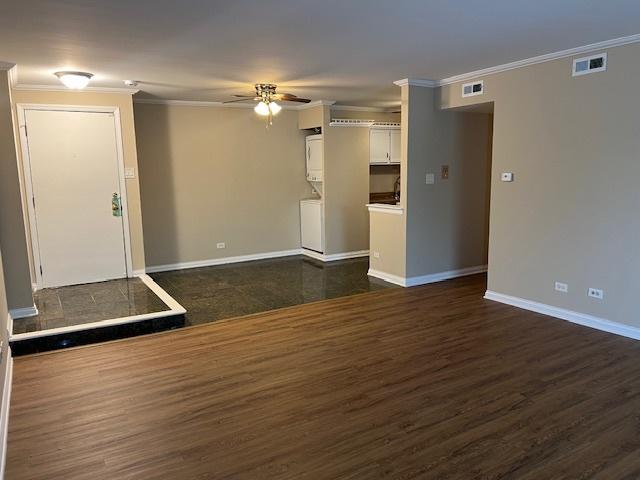 18063 Live Oak Ct Unit 1608, Tinley Park, IL 60477 - unfurnished living room with ceiling fan, crown molding, baseboards, and dark wood-style flooring