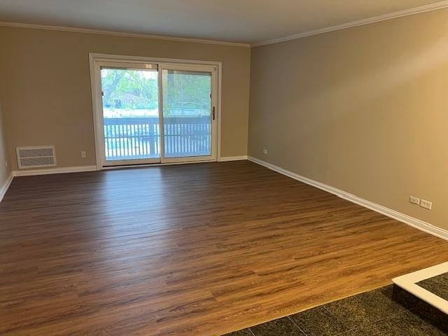18063 Live Oak Ct Unit 1608, Tinley Park, IL 60477 - empty room featuring baseboards, dark wood-type flooring, and crown molding