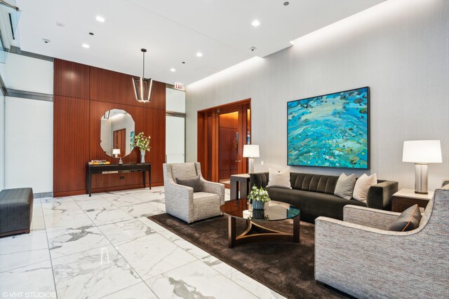 77 E Walton St Unit 25C, Chicago, IL 60611 - building lobby with a high ceiling and recessed lighting