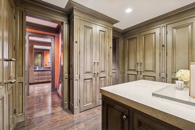 77 E Walton St Unit 25C, Chicago, IL 60611 - bathroom featuring a decorative wall, wood finished floors, and ornamental molding