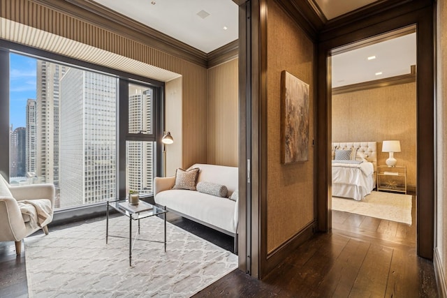 77 E Walton St Unit 25C, Chicago, IL 60611 - sitting room featuring crown molding and dark wood-style floors