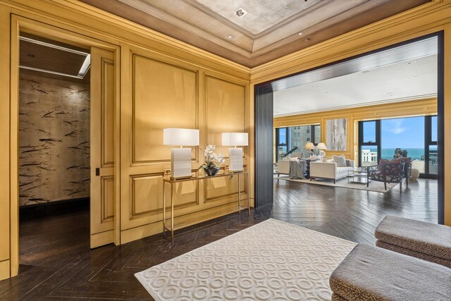 77 E Walton St Unit 25C, Chicago, IL 60611 - community lobby featuring ornamental molding and a decorative wall