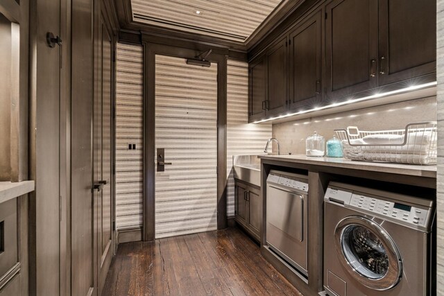 77 E Walton St Unit 25C, Chicago, IL 60611 - washroom with cabinet space, dark wood-style flooring, and washer and dryer