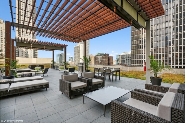77 E Walton St Unit 25C, Chicago, IL 60611 - view of patio / terrace with a pergola, an outdoor hangout area, outdoor dining space, and a view of city