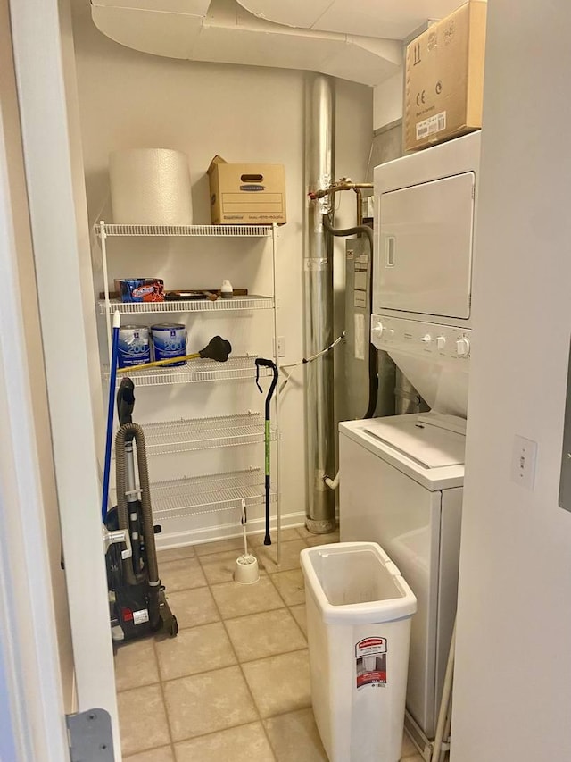 656 Pearson St Unit 608C, Des Plaines, IL 60016 - laundry area featuring stacked washer / dryer and tile patterned flooring