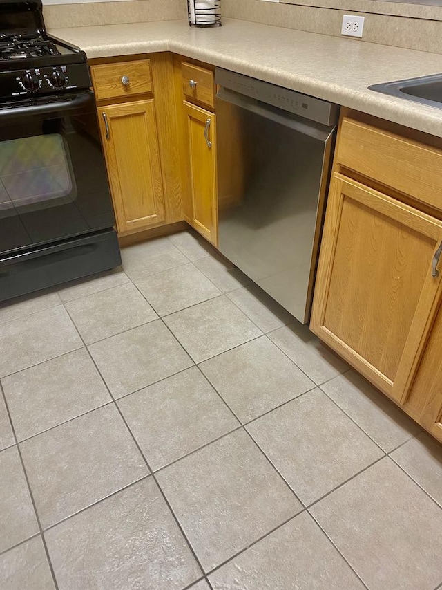 656 Pearson St Unit 608C, Des Plaines, IL 60016 - kitchen featuring dishwasher, black range with gas stovetop, light tile patterned floors, and light countertops