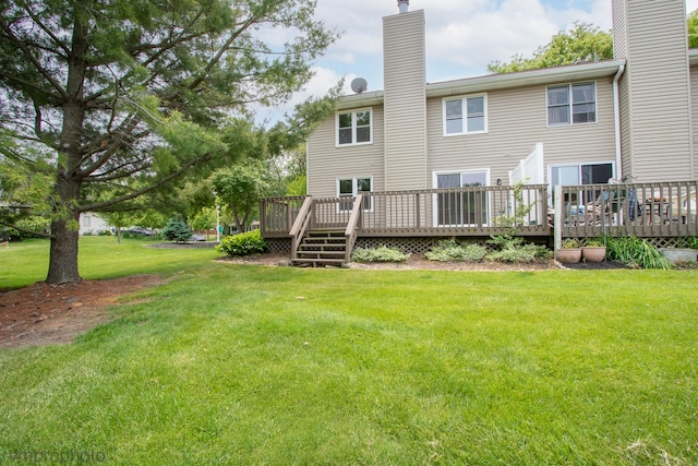 300 Hunters Cir, Fox River Grove, IL 60021 - back of property featuring a chimney, a wooden deck, and a lawn