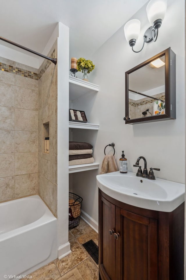 8139 W Bryn Mawr Ave, Norwood Park, IL 60631 - full bathroom with vanity,  shower combination, and baseboards