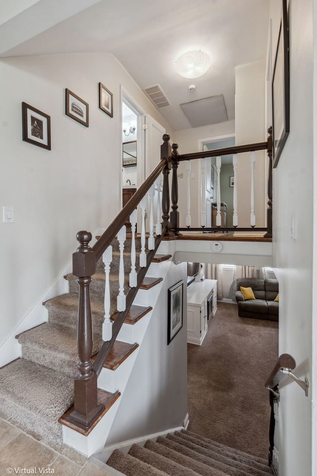 8139 W Bryn Mawr Ave, Norwood Park, IL 60631 - staircase featuring carpet flooring and vaulted ceiling