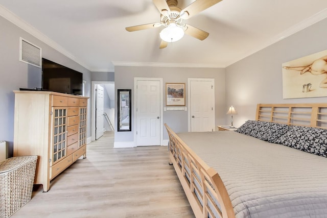 bedroom featuring crown molding, light wood-style floors, baseboards, and a ceiling fan