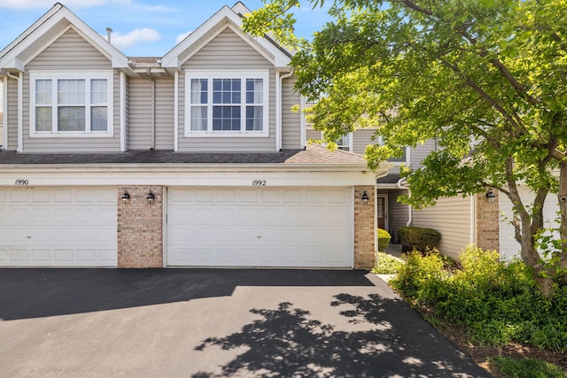 1992 Town Dr, Naperville, IL 60565 - multi unit property with brick siding, driveway, and an attached garage