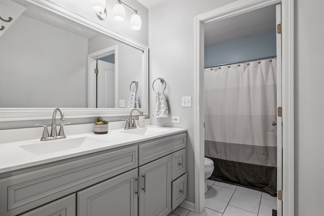 1992 Town Dr, Naperville, IL 60565 - bathroom with marble look tiles, toilet, double vanity, and a shower with curtain