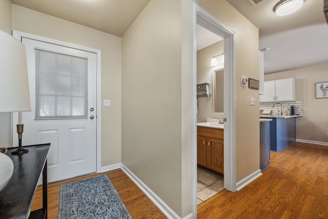 1992 Town Dr, Naperville, IL 60565 - foyer entrance featuring wood finished floors and baseboards