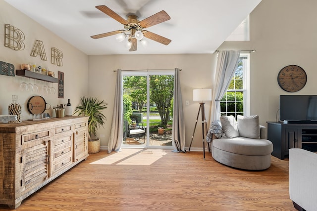 1992 Town Dr, Naperville, IL 60565 - living area featuring ceiling fan, light wood-style flooring, and baseboards