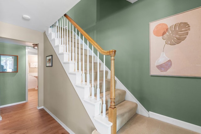 1712 Sutton Ln, Schaumburg, IL 60194 - staircase with baseboards and wood finished floors