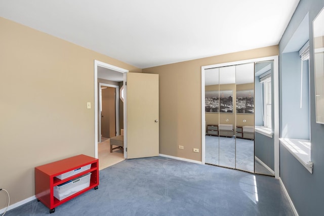 1712 Sutton Ln, Schaumburg, IL 60194 - unfurnished bedroom featuring a closet, carpet floors, and baseboards