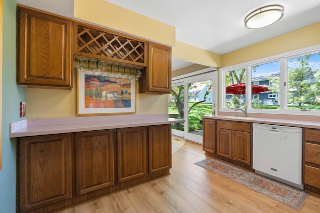 1712 Sutton Ln, Schaumburg, IL 60194 - bar featuring dishwasher, light wood finished floors, and a sink