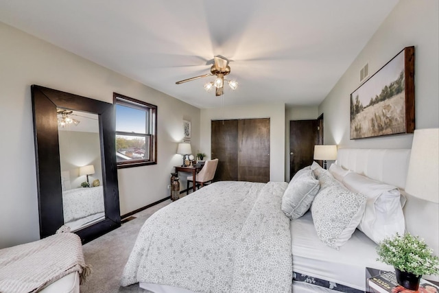 bedroom with carpet floors, a ceiling fan, and baseboards