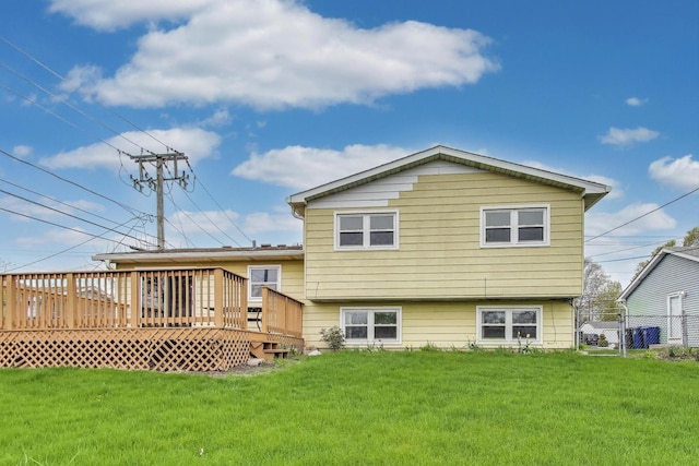 back of property with a wooden deck