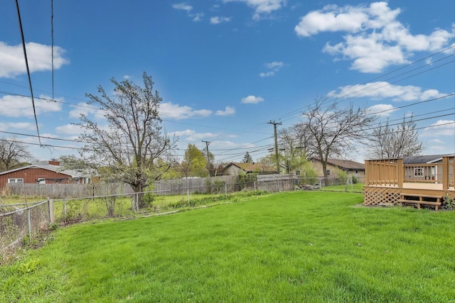 view of yard with a wooden deck