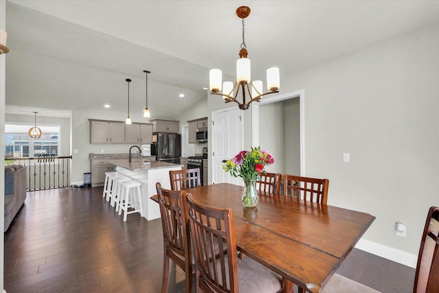 3901 Obsidian Dr, Champaign, IL 61822 - dining area with a chandelier, lofted ceiling, dark wood-style floors, baseboards, and recessed lighting