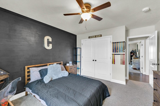 3901 Obsidian Dr, Champaign, IL 61822 - bedroom featuring baseboards, carpet, a closet, and a ceiling fan