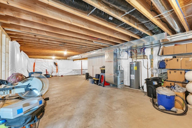 3901 Obsidian Dr, Champaign, IL 61822 - unfinished below grade area featuring electric water heater and heating unit