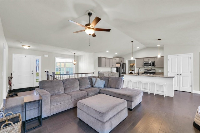 3901 Obsidian Dr, Champaign, IL 61822 - living room featuring lofted ceiling, a ceiling fan, and dark wood-style floors
