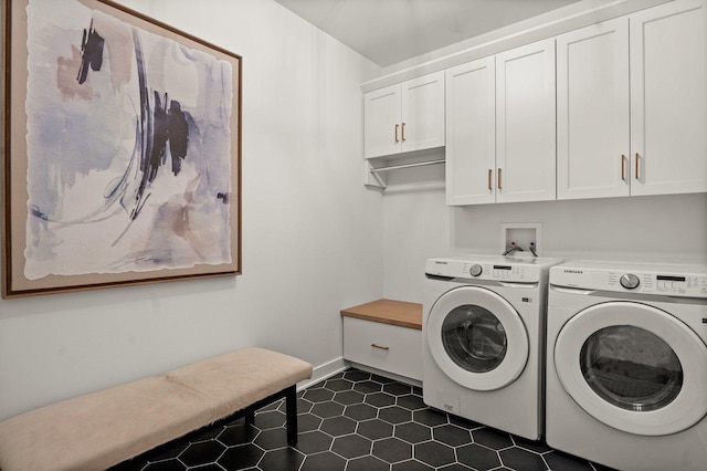 1553 Dempsey Dr, Saint Charles, IL 60174 - laundry room featuring cabinet space, washing machine and clothes dryer, dark tile patterned floors, and baseboards